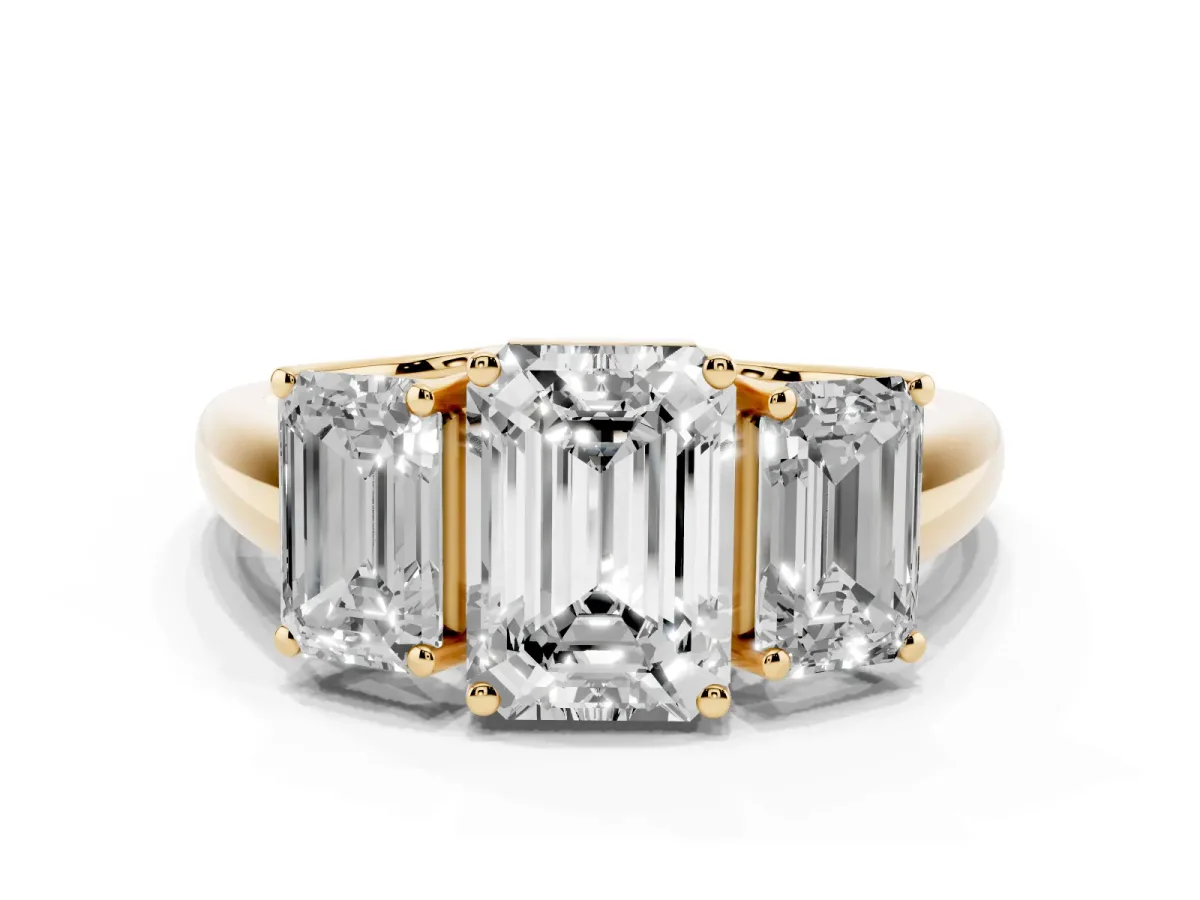 Three-Stone Emerald Cut Diamond Engagement Ring with Prong Setting Yellow gold