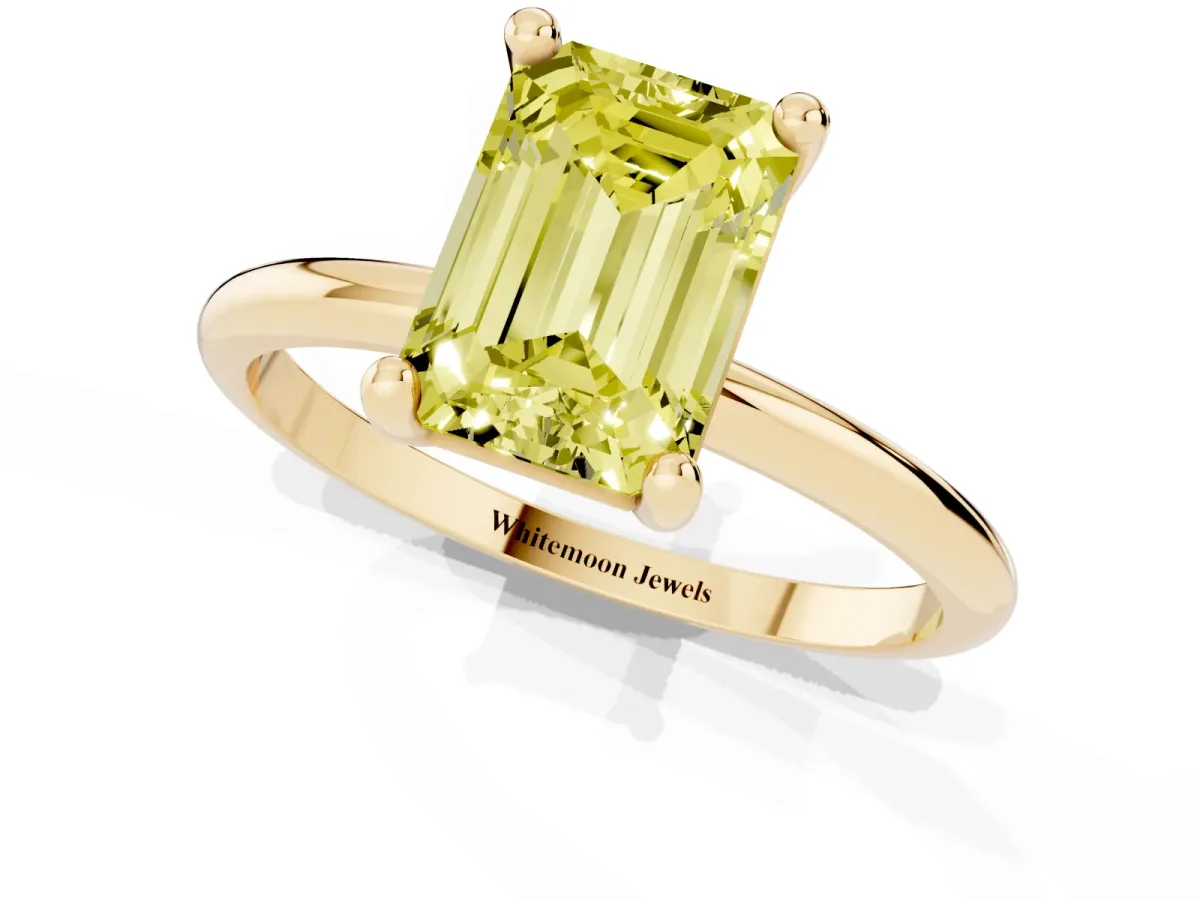 Fancy Yellow Emerald Cut Solitaire Diamond Ring with 4-Prong Setting on a Classic Band Yellow gold