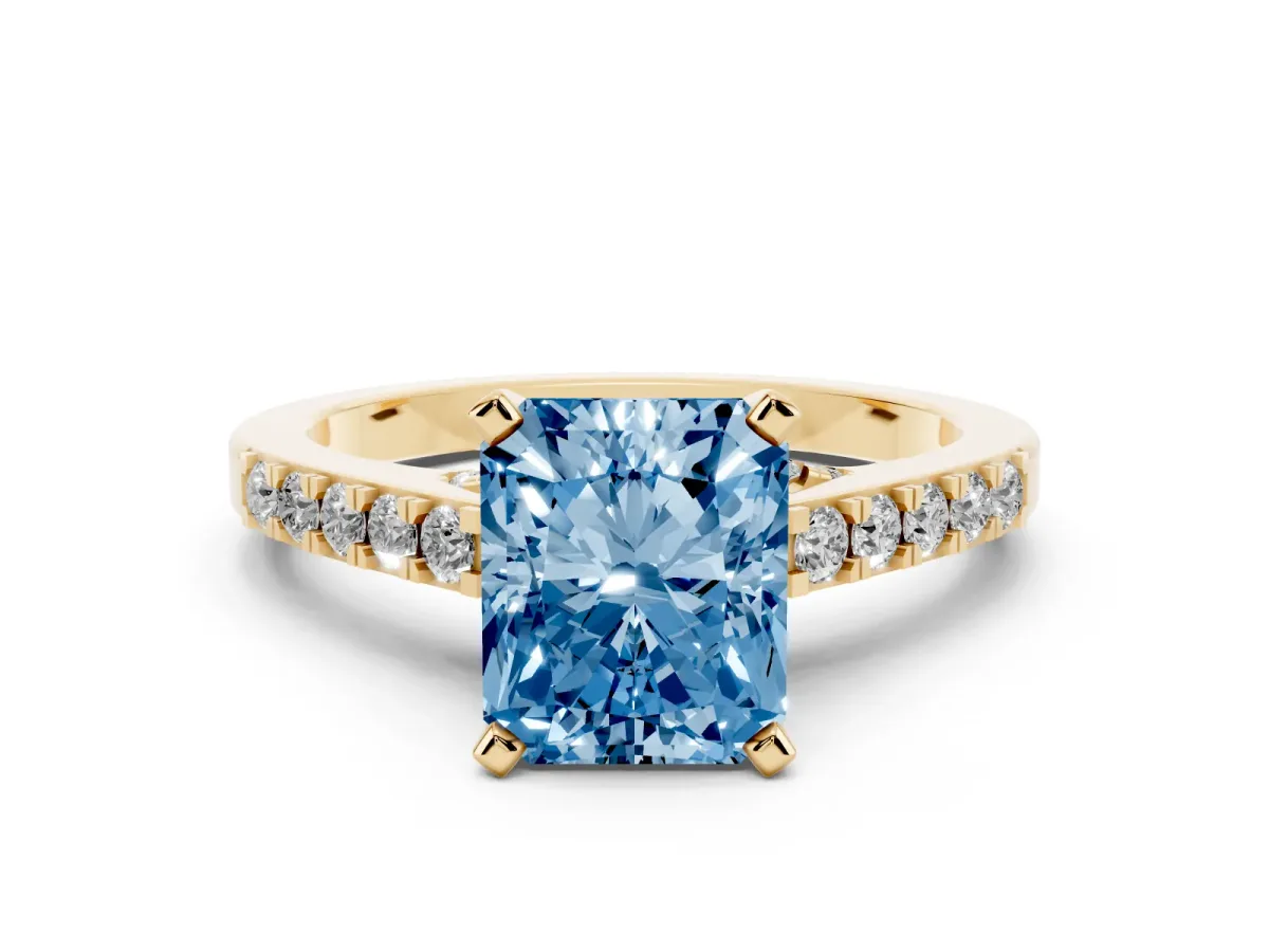 Fancy Blue Radiant Cut Diamond Solitaire Ring with Crossover Gallery and Round Pavé Band Yellow gold