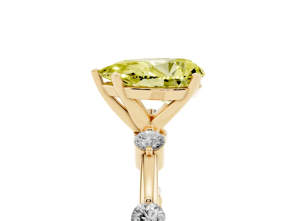 Fancy Yellow Pear Cut Solitaire Diamond Ring with Bezel Set Side Stones and Prong Setting Yellow gold