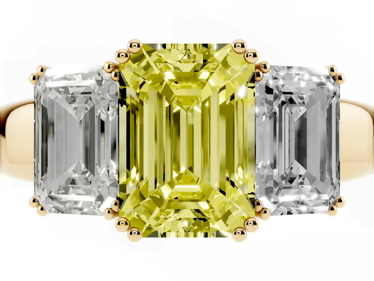 Fancy Yellow Three-Stone Emerald Cut Cut Diamond Ring with Channel Set Band and Four-Prong Setting Yellow gold