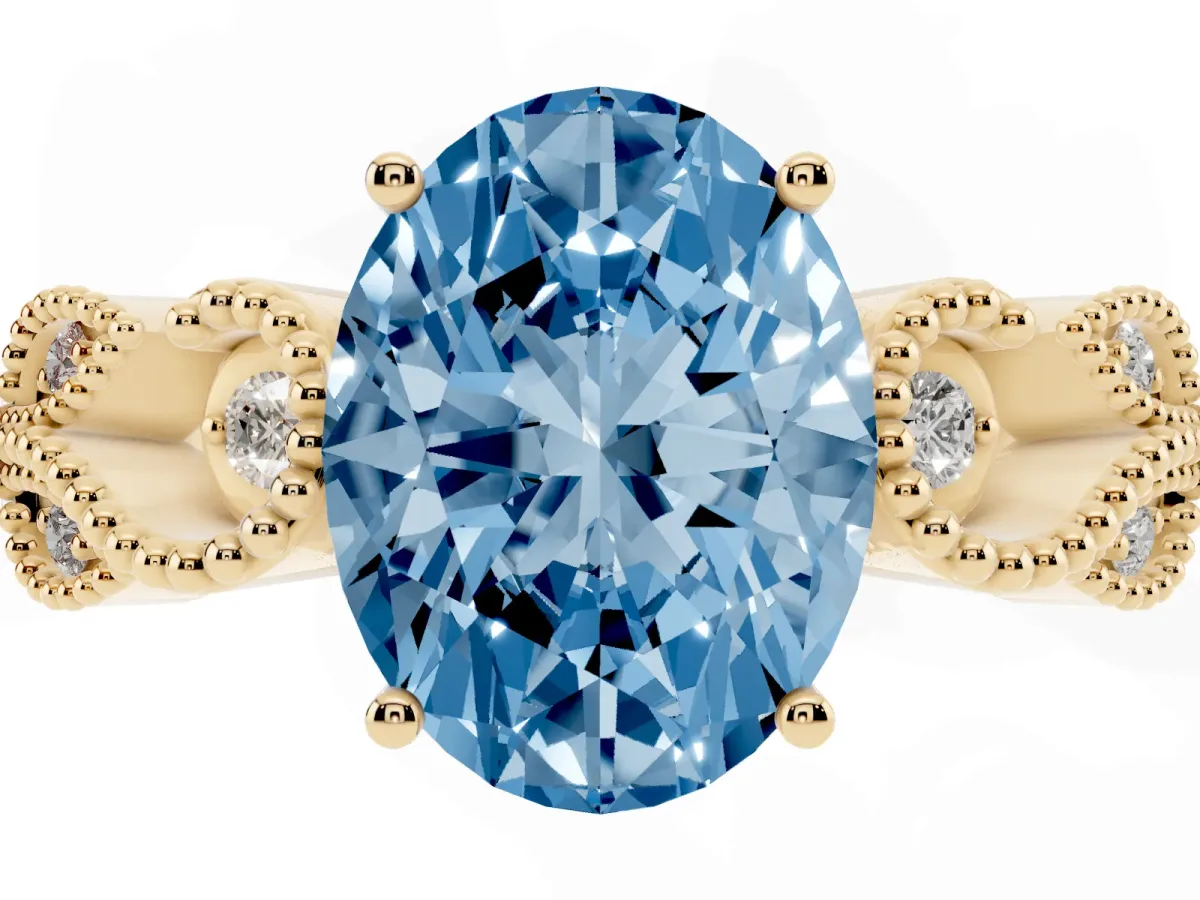 Fancy Blue Oval Cut Solitaire Milgrain Leaf Band with Prong Setting Yellow gold
