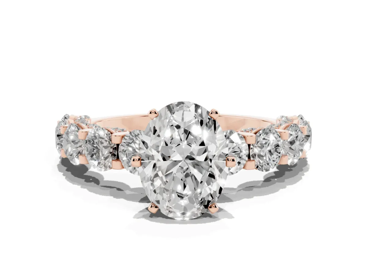 Oval Cut Diamond Side Stone Engagement Ring with Four-Prong Setting Rose gold