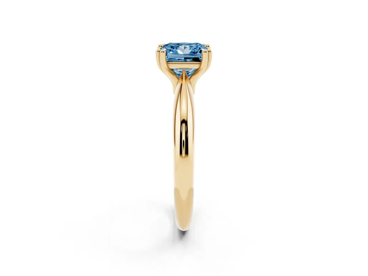 Fancy Blue Princess Cut Cut Solitaire Engagement Ring with Tapered Band and Four-Prong Setting Yellow gold