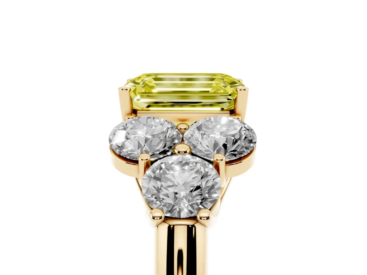 Fancy Yellow Emerald Cut Cut Diamond Cluster Ring with Round Accent Stones and Prong Setting on a Classic Band Yellow gold
