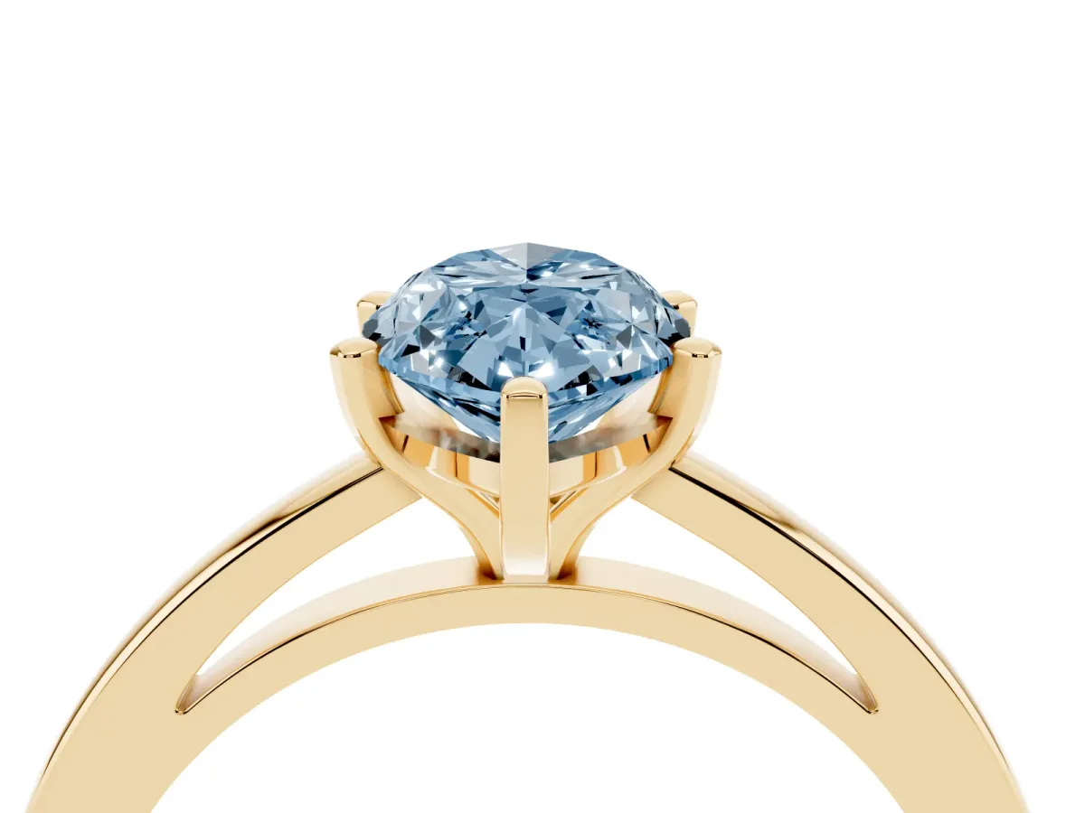 Fancy Blue Marquise Cut Solitaire Diamond Engagement Ring with Four-Prong Setting on a Classic Band Yellow gold