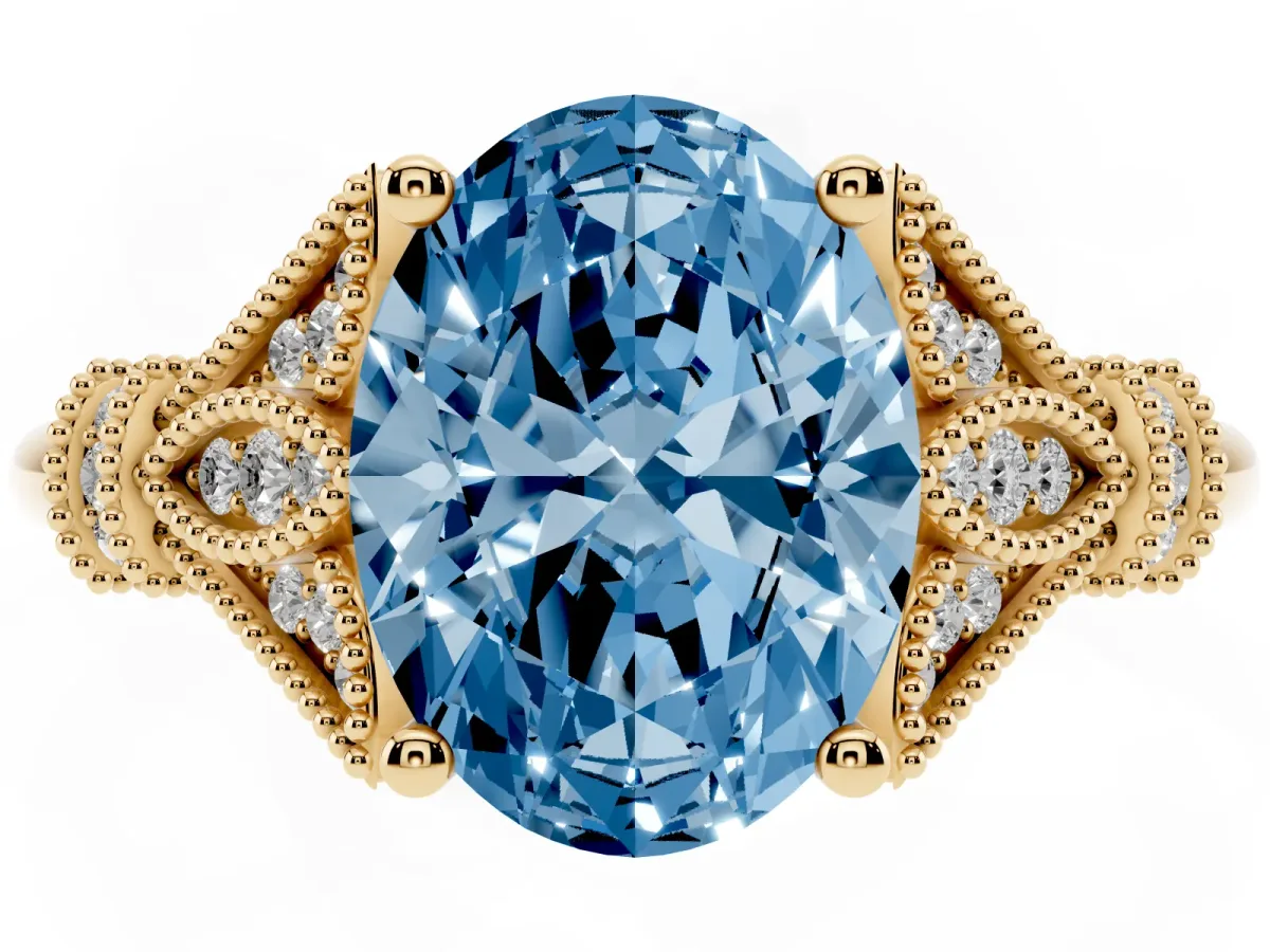 Fancy Blue Oval Cut Diamond Solitaire Ring with Floral Filigree and Pave Accents Yellow gold