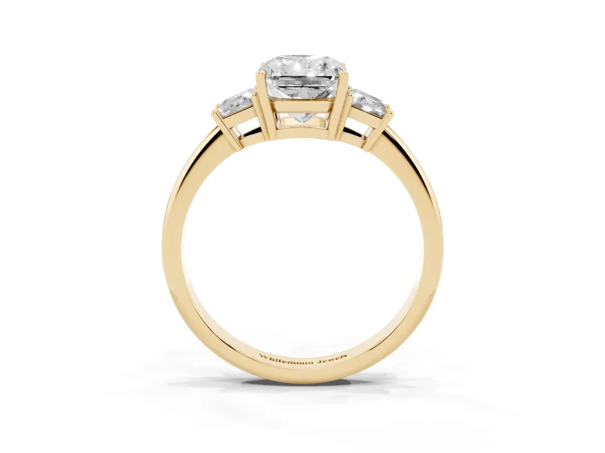 Radiant Cut Diamond Three-Stone Ring with Trapezoid Side Stones and Prong Setting Yellow gold