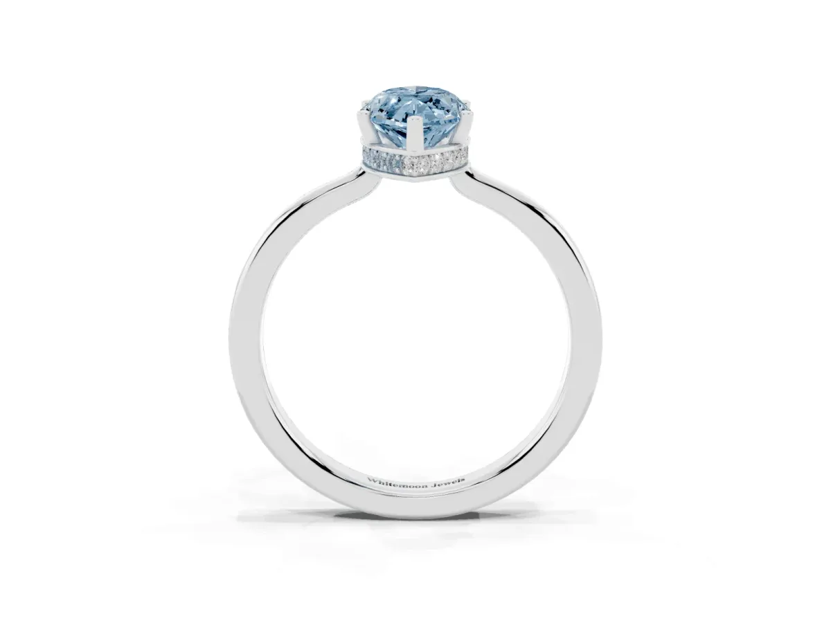 Fancy Blue Marquise Cut Cut Solitaire Engagement Ring with Four-Prong Setting on a Classic Band Silver