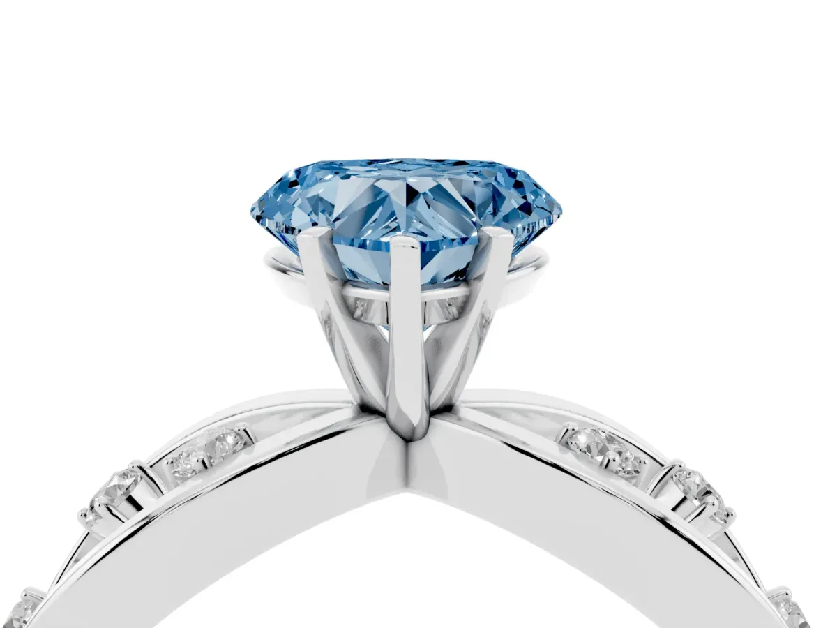 Fancy Blue Heart Cut Cut Solitaire Diamond with Side Stones on Criss-Cross Band and Four-Prong Setting Silver