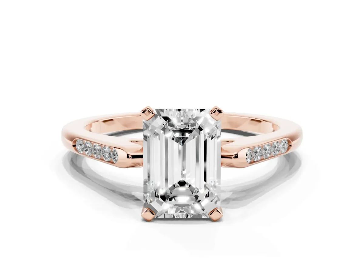 Emerald Cut Diamond Solitaire Ring with Channel Set Round Band and Prong Setting Rose gold