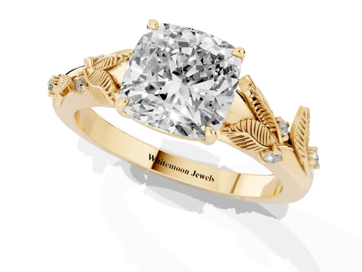 Cushion Cut Diamond Solitaire Ring with Leaf Motif Band and Four-Prong Setting Yellow gold