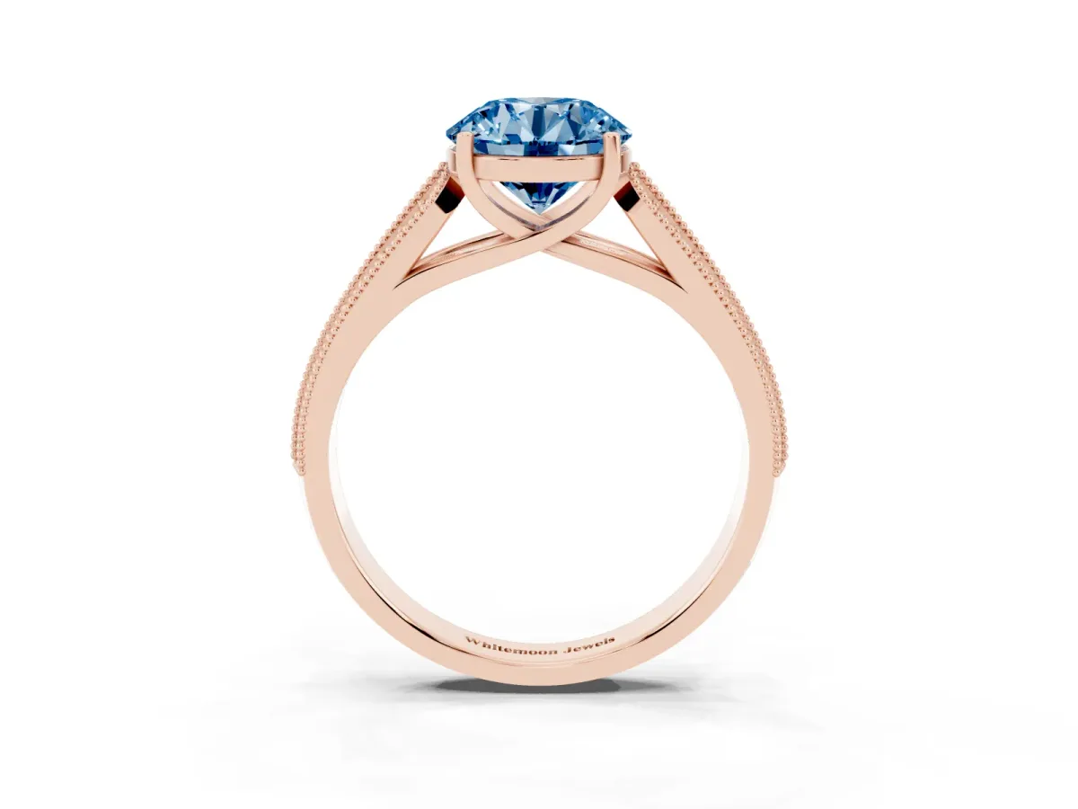 Fancy Blue Round Cut Cut Pave Split Shank Engagement Ring with Four-Prong Setting Rose gold