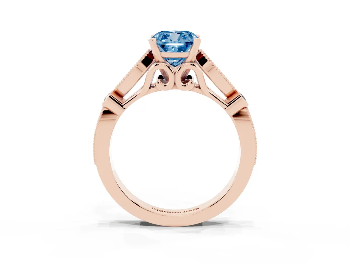 Fancy Blue Cushion Cut Cut Diamond with Milgrain Marquise and Bezel Accents on a Solitaire Band with Prong Setting Rose gold