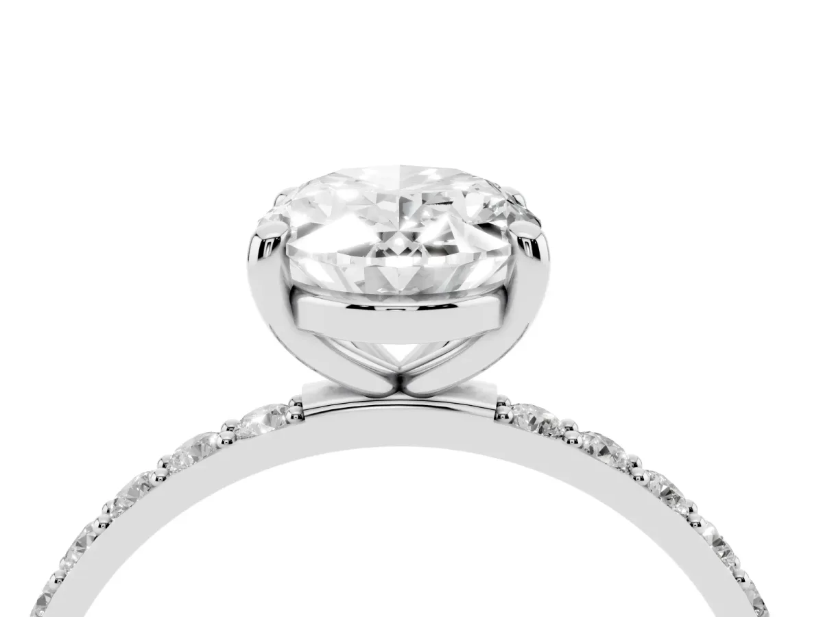 Oval Cut Diamond Solitaire Ring with Round Pavé Band and Prong Setting Silver