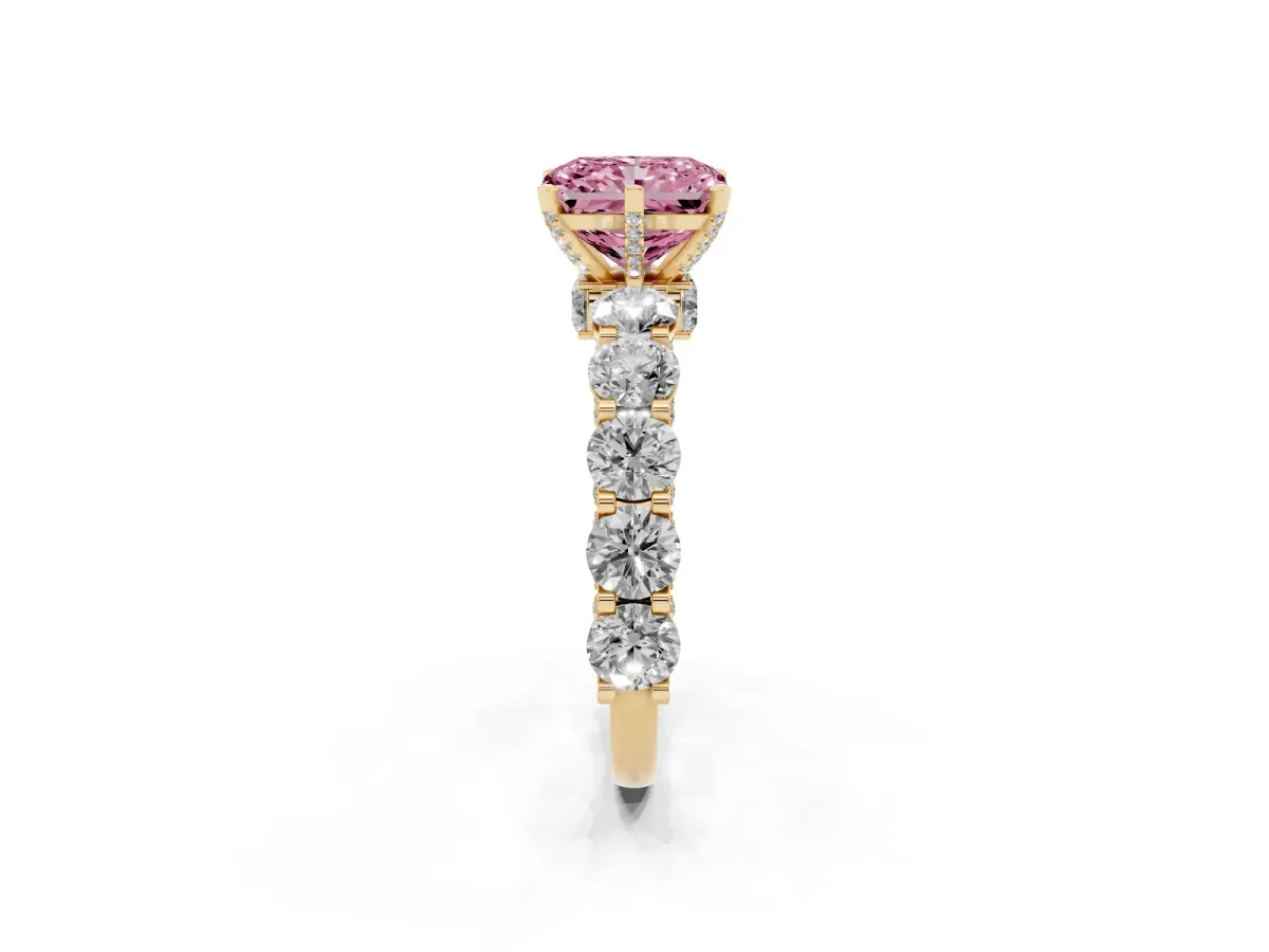 Fancy Pink Radiant Cut Diamond Side Stone Engagement Ring with Four-Prong Setting Yellow gold