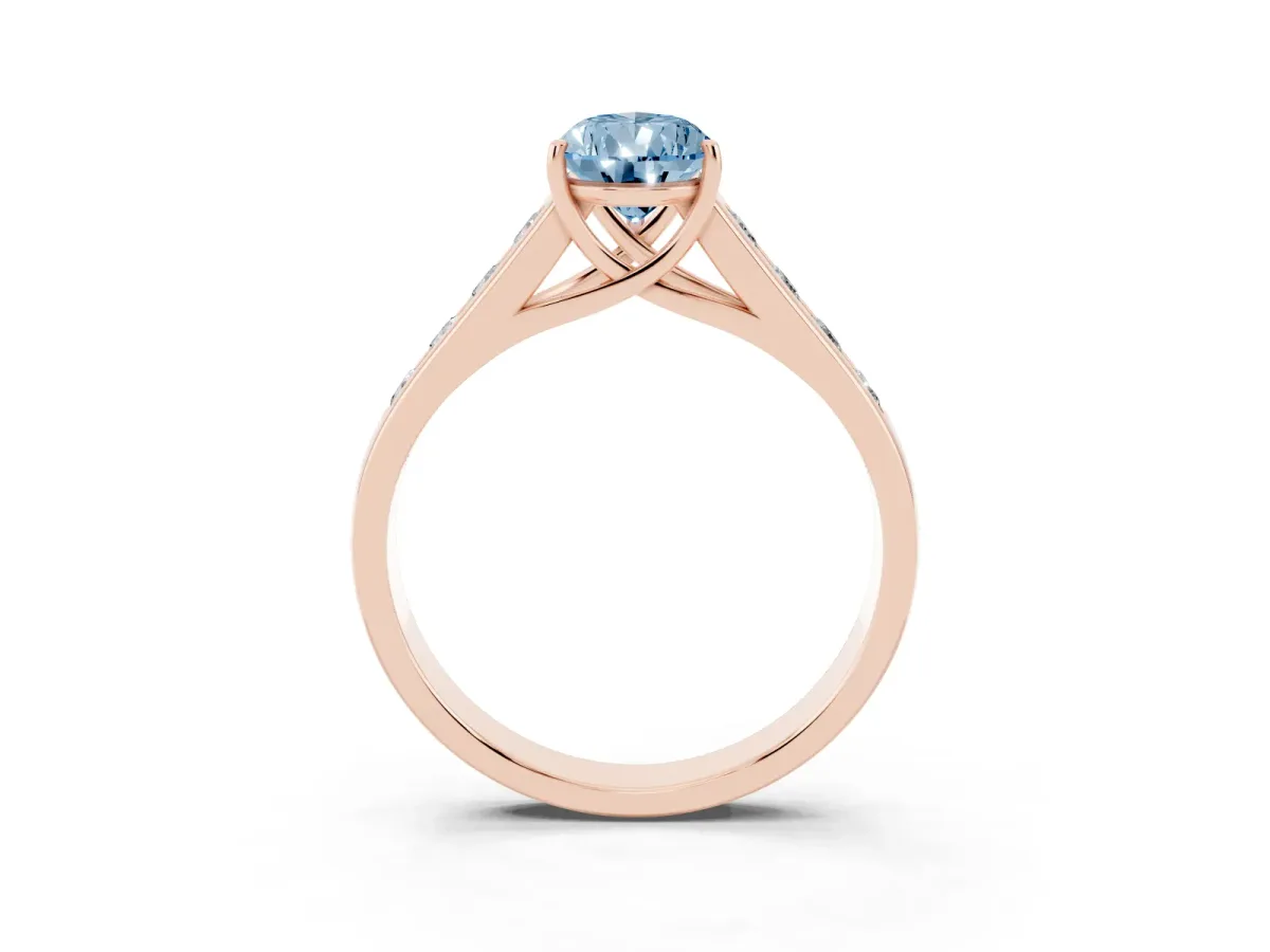 Fancy Blue Pear Cut Brilliant Channel-Set Solitaire Ring with Four-Prong Setting Rose gold