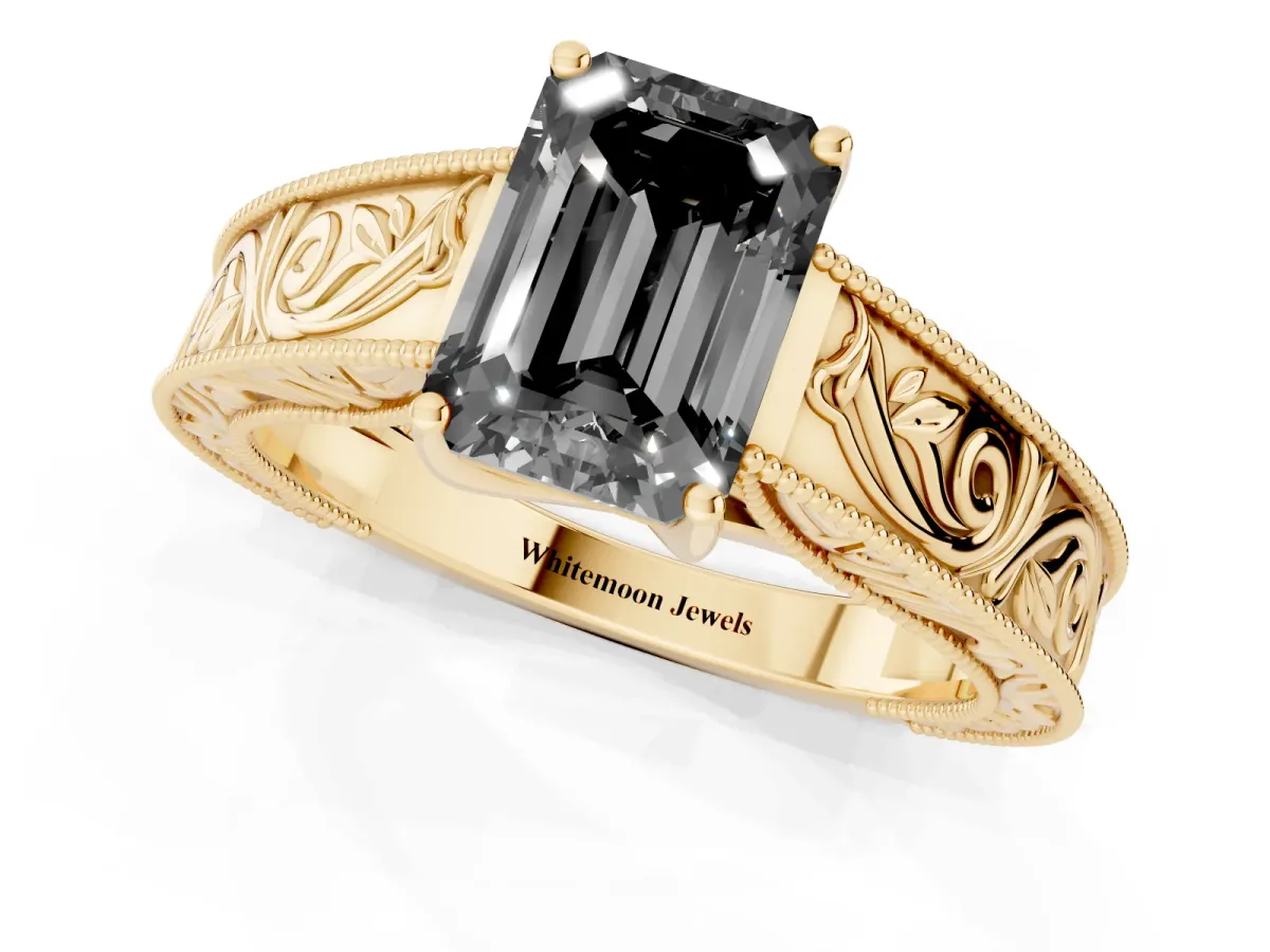 Fancy Black Emerald Cut Diamond Solitaire Ring with Engraved Band and Four-Prong Setting Yellow gold