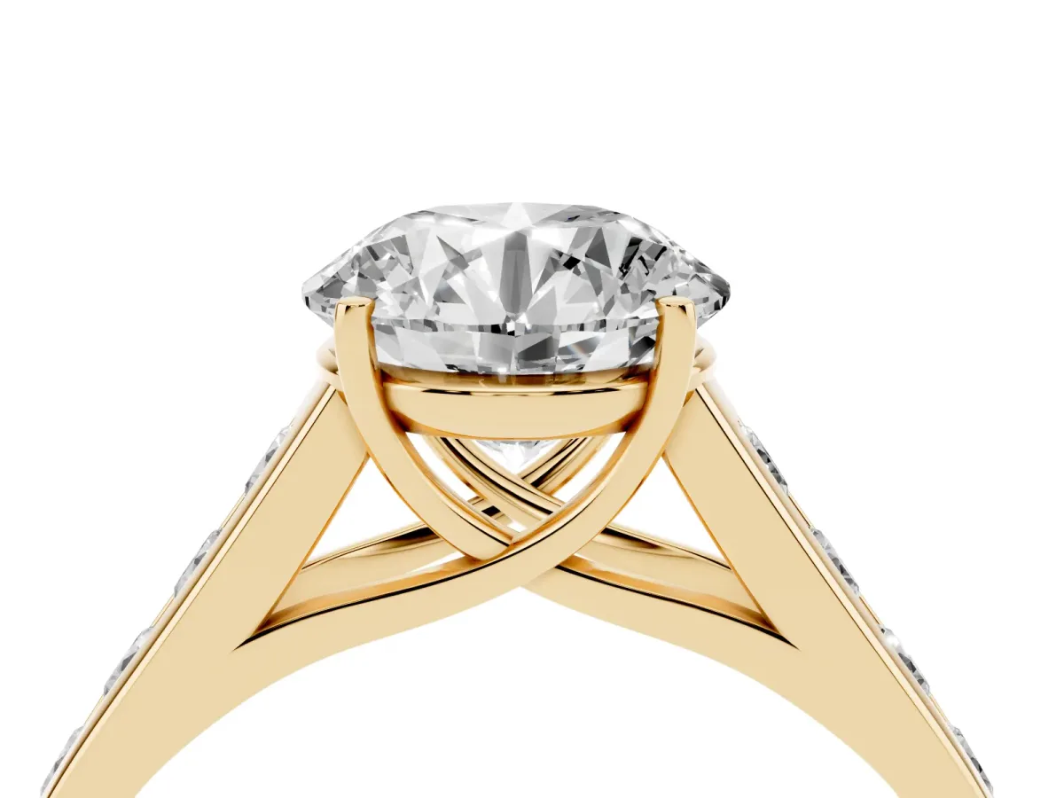 Round Cut Brilliant Channel-Set Solitaire Ring with Four-Prong Setting Yellow gold