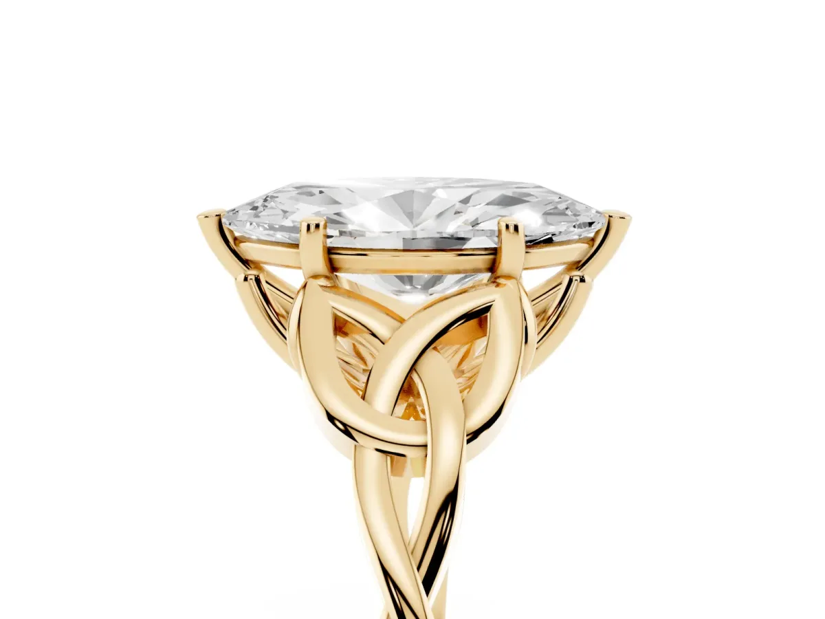 Marquise Cut Diamond Solitaire Engagement Ring with Celtic Knot Band and Four-Prong Setting Yellow gold