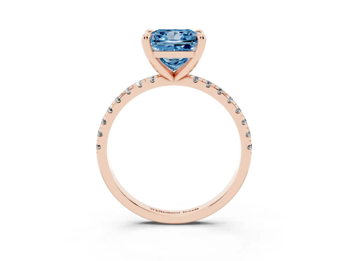 Fancy Blue Princess Cut Diamond Brilliant Solitaire Ring with Pavé Band and Four-Prong Setting Rose gold