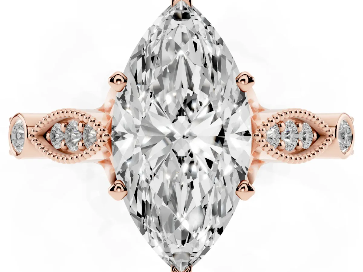 Marquise Cut Cut Diamond with Milgrain Marquise and Bezel Accents on a Solitaire Band with Prong Setting Rose gold