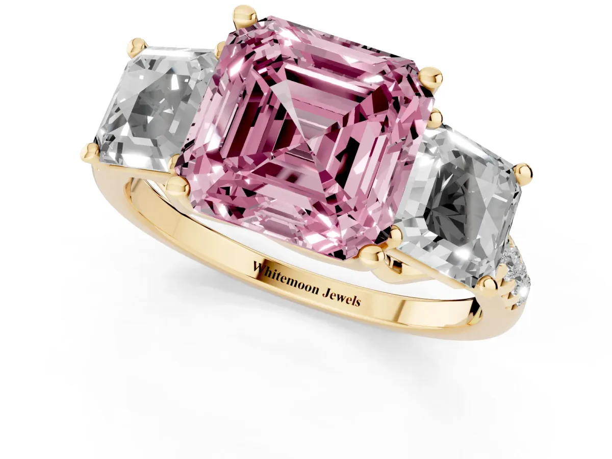 Fancy Pink Three-Stone Asscher Cut Diamond Ring with Round Pavé Band and Prong Setting Yellow gold