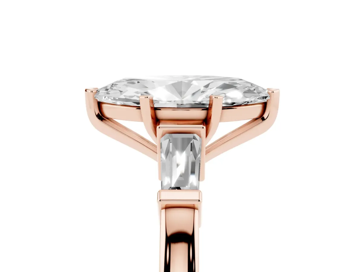 Marquise Cut Cut Diamond Solitaire Ring with Tapered Baguette Accents and Four-Prong Setting Rose gold