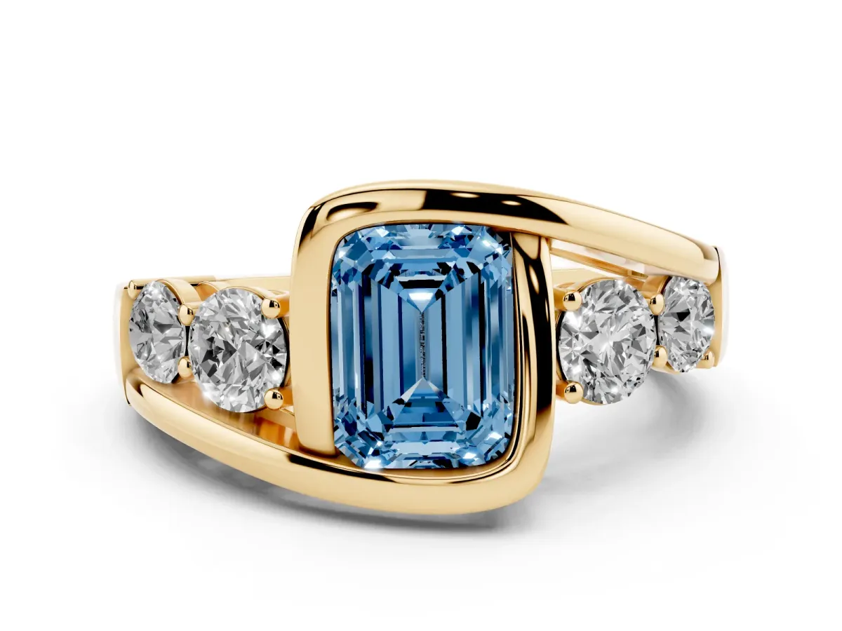 Fancy Blue Bezel Set Emerald Cut Diamond Bypass Ring with Round Accents Yellow gold