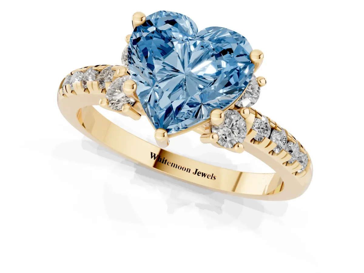 Fancy Blue Heart Cut Diamond Three-Stone Pave Band with Four-Prong Setting Yellow gold