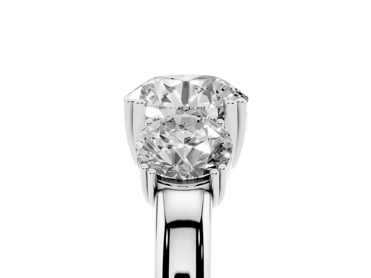 Three-Stone Round Cut Cut Diamond Ring with Channel Set Band and Four-Prong Setting Silver