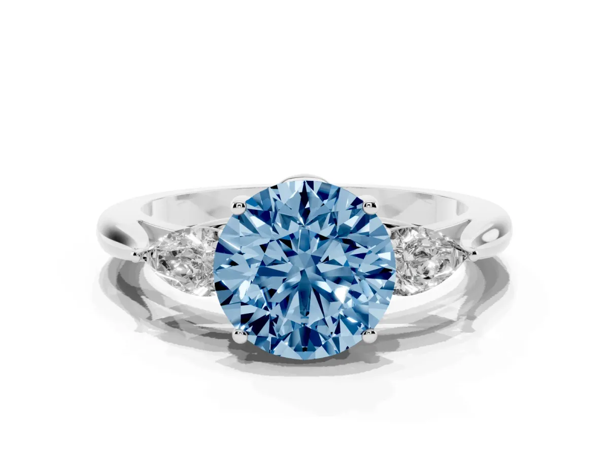 Fancy Blue Round Cut Diamond Three-Stone Ring with Pear Side Stones and Prong Setting Platinum