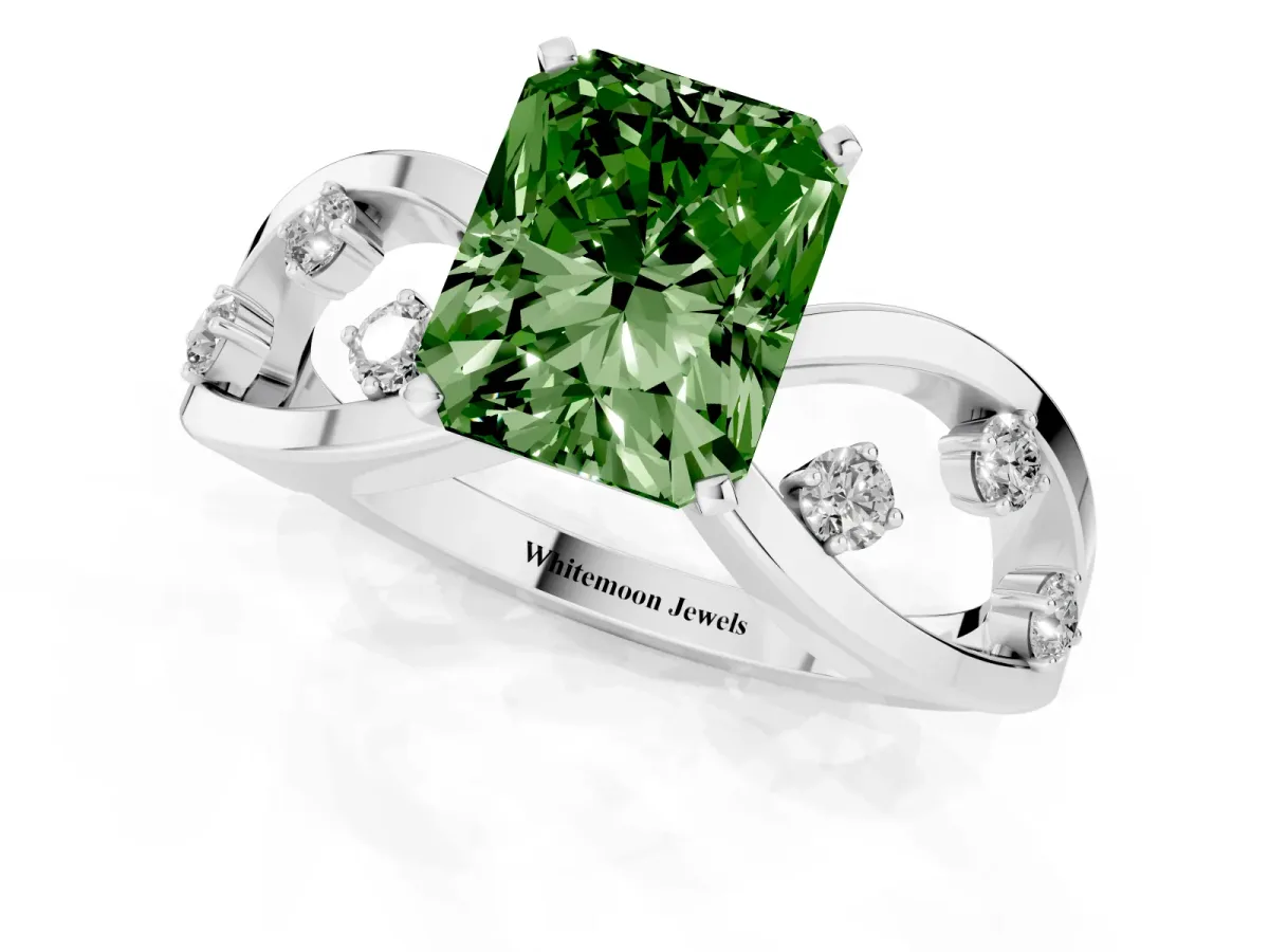 Fancy Green Radiant Cut Cut Solitaire Diamond with Side Stones on Criss-Cross Band and Four-Prong Setting Platinum