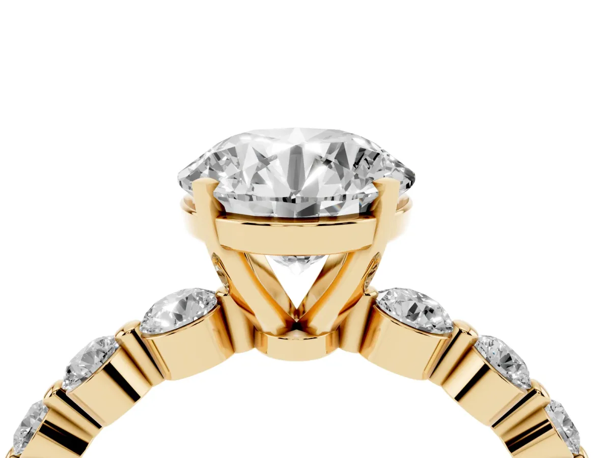 Round Cut Solitaire Diamond Ring with Pave Band and Four-Prong Setting Yellow gold