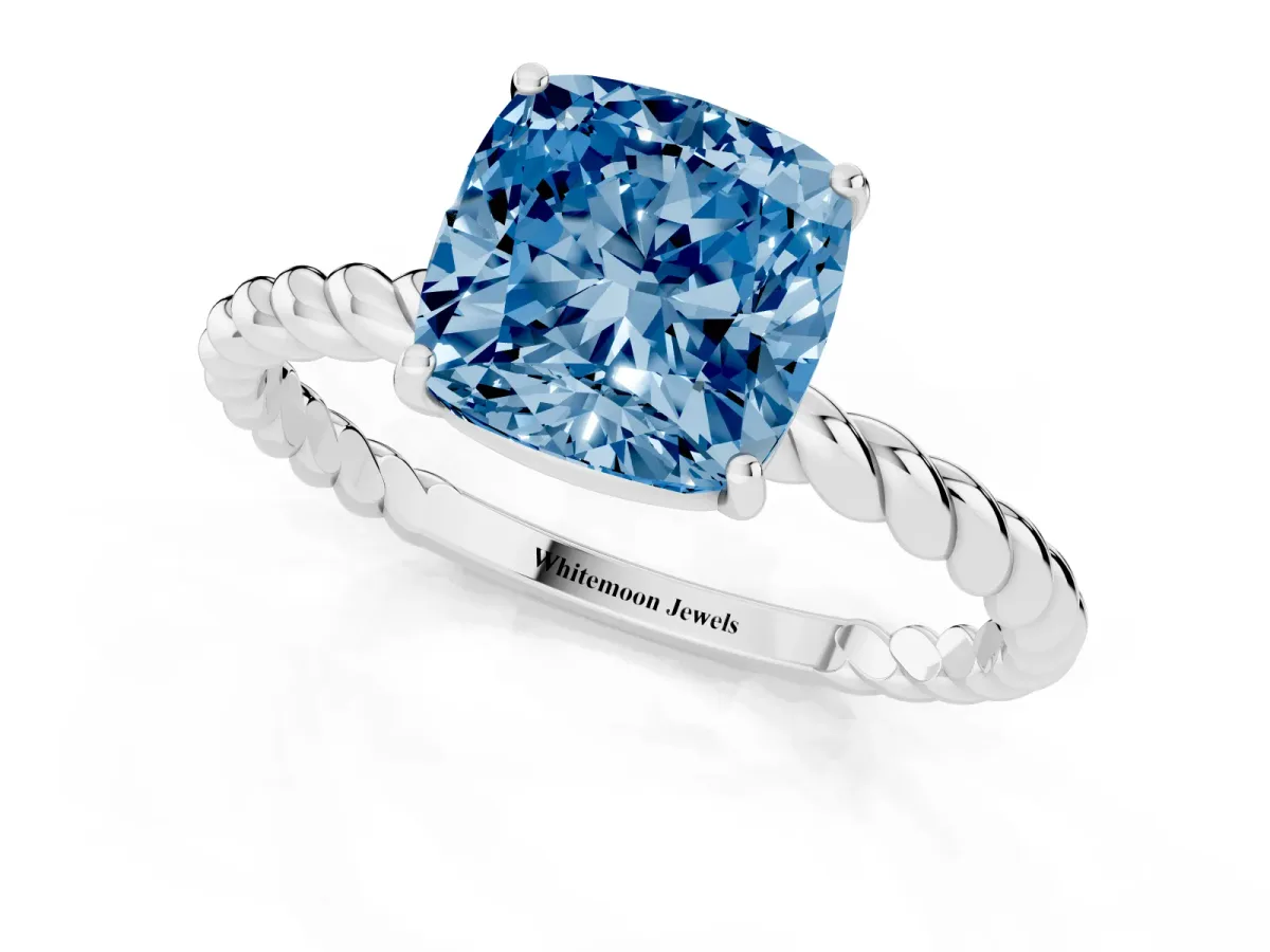 Fancy Blue Cushion Cut Solitaire Twist Band Ring with Four-Prong Setting Platinum