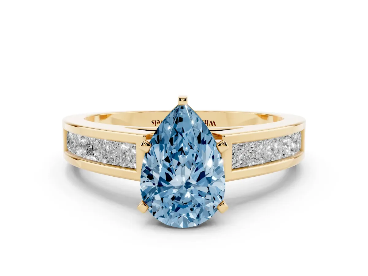 Fancy Blue Pear Cut Solitaire Diamond Ring with Channel-Set Band and Four-Prong Setting Yellow gold