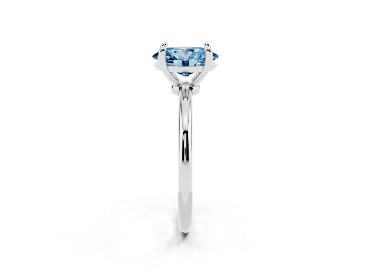 Fancy Blue Oval Cut Solitaire Diamond Ring with 4-Prong Setting on a Classic Band Silver