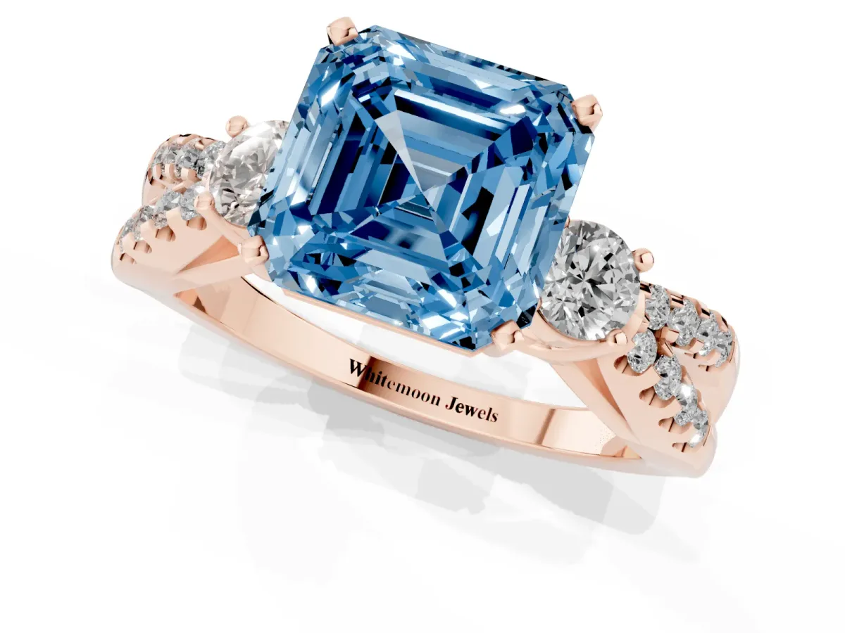 Fancy Blue Asscher Cut Diamond Three-Stone Ring with Pavé Split Shank and Four-Prong Setting Rose gold