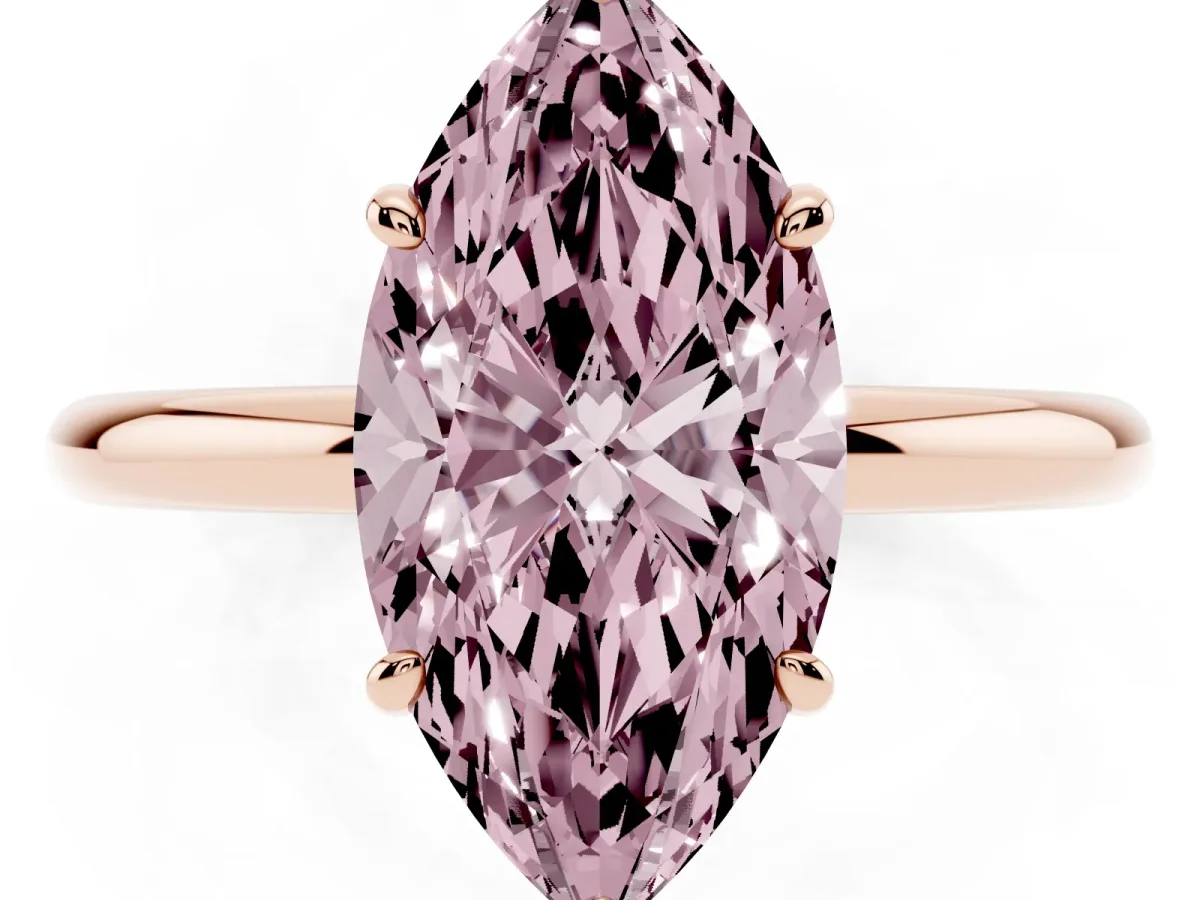 Fancy Pink Oval Cut Solitaire Diamond Ring with Four-Prong Setting on a Plain Band Rose gold