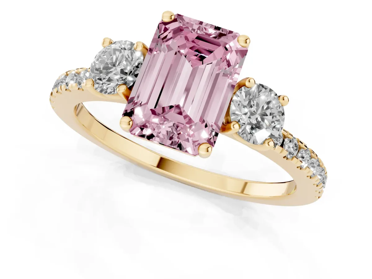 Fancy Pink Three-Stone Emerald Cut Cut Diamond Pavé Band with Prong Setting Yellow gold