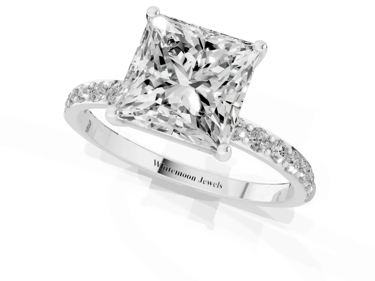 Princess Cut Diamond Solitaire Ring with Round Pavé Shoulders and Prong Setting Silver