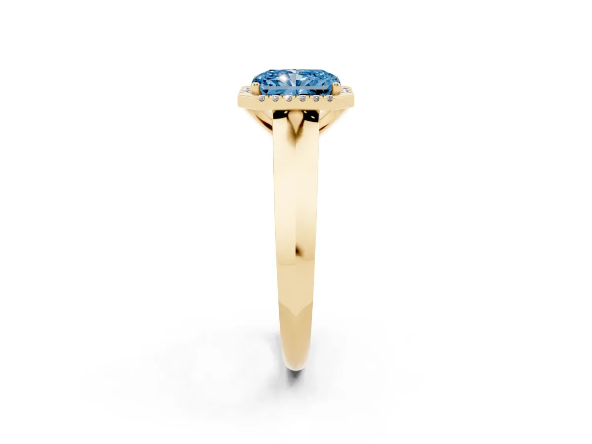 Fancy Blue Radiant Cut Halo Diamond Ring with Cathedral Band and Four-Prong Setting Yellow gold
