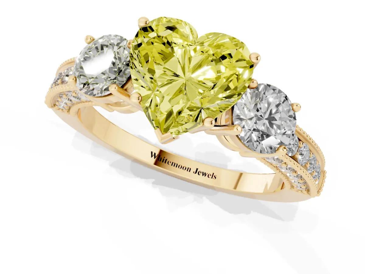Fancy Yellow Heart Cut Three-Stone Diamond Ring with Pavé Band and Four-Prong Setting Yellow gold