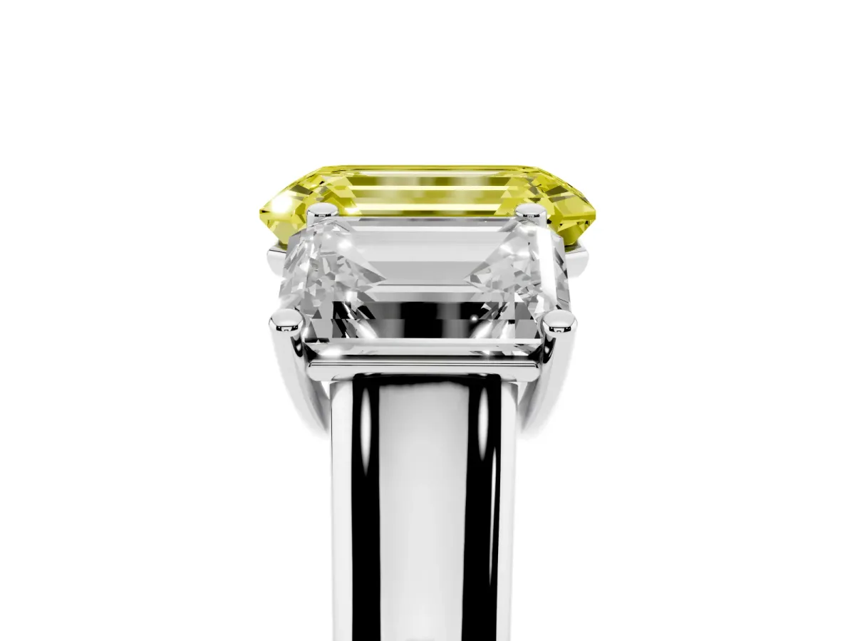 Fancy Yellow Emerald Cut Three-Stone Diamond Ring with Prong Setting on a Classic Band Silver