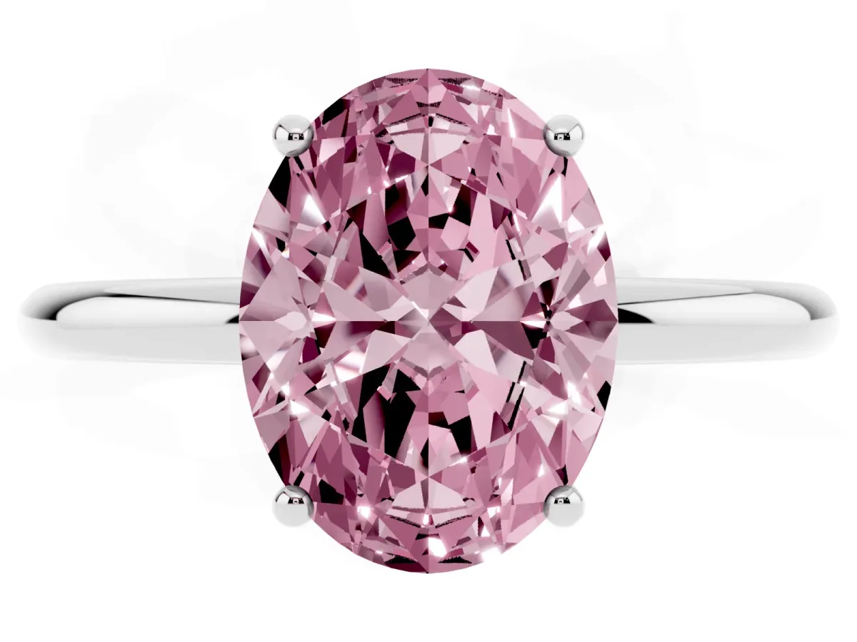 Fancy Pink Oval Cut Solitaire Diamond Ring with a Classic Band and Four-Prong Setting Silver