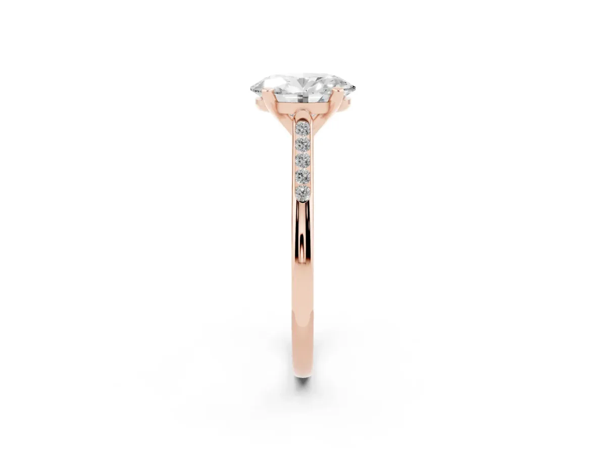 Oval Cut Diamond Solitaire Ring with Channel Set Round Band and Prong Setting Rose gold