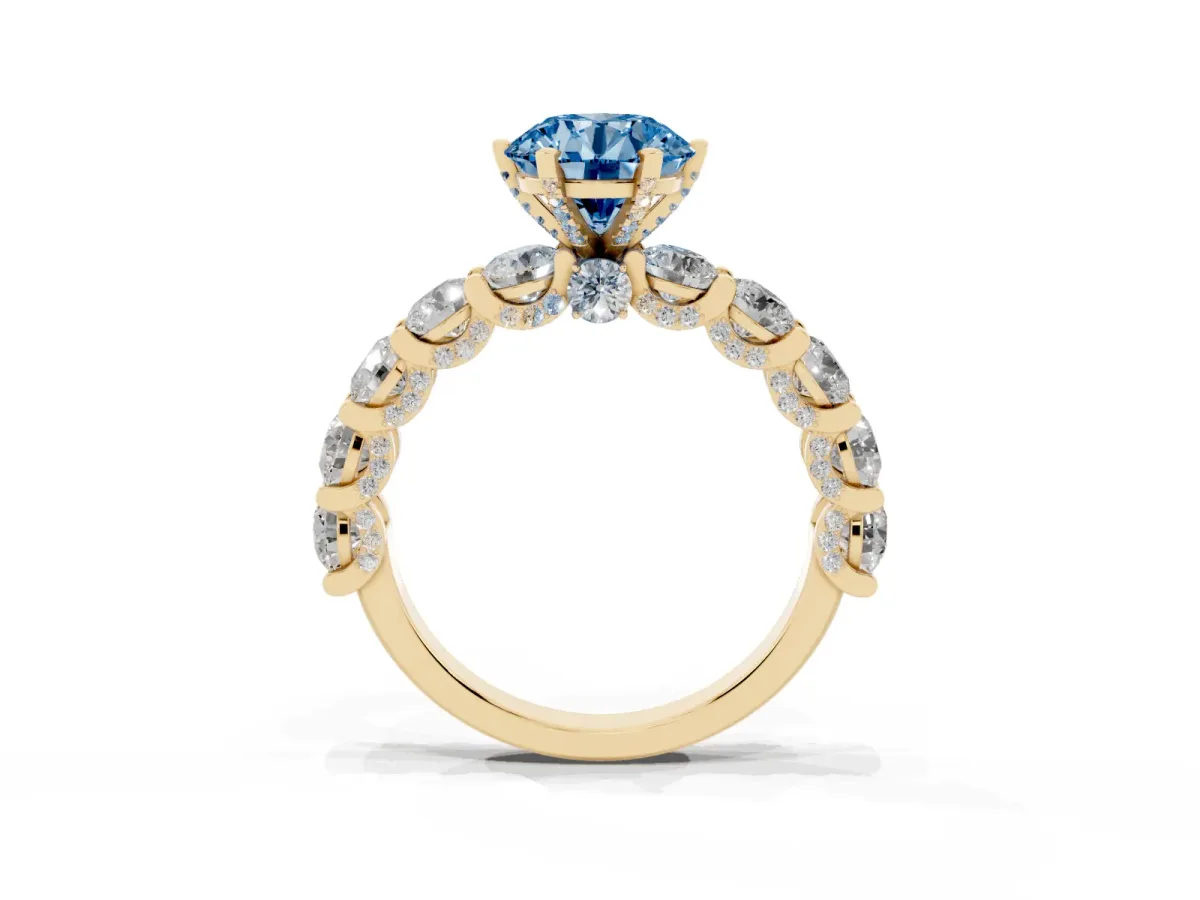 Fancy Blue Round Cut Diamond Side Stone Engagement Ring with Four-Prong Setting Yellow gold