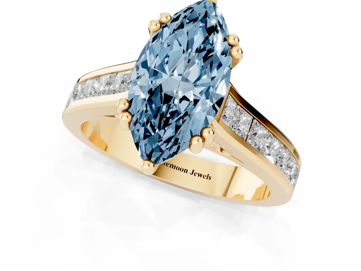 Fancy Blue Marquise Cut Cut Channel Set Solitaire Engagement Ring with Prong Setting Yellow gold