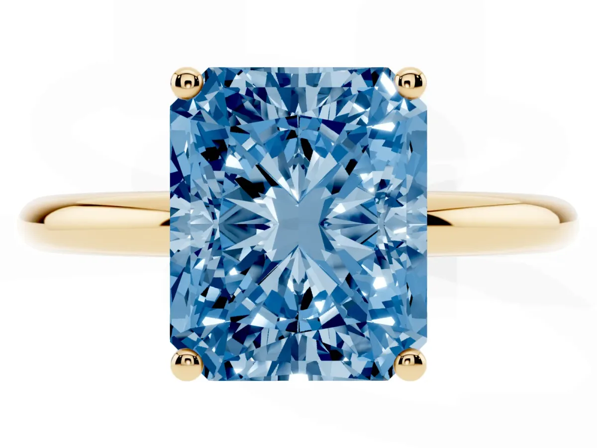Fancy Blue Radiant Cut Cut Solitaire Engagement Ring with Four-Prong Setting and Classic Band Yellow gold