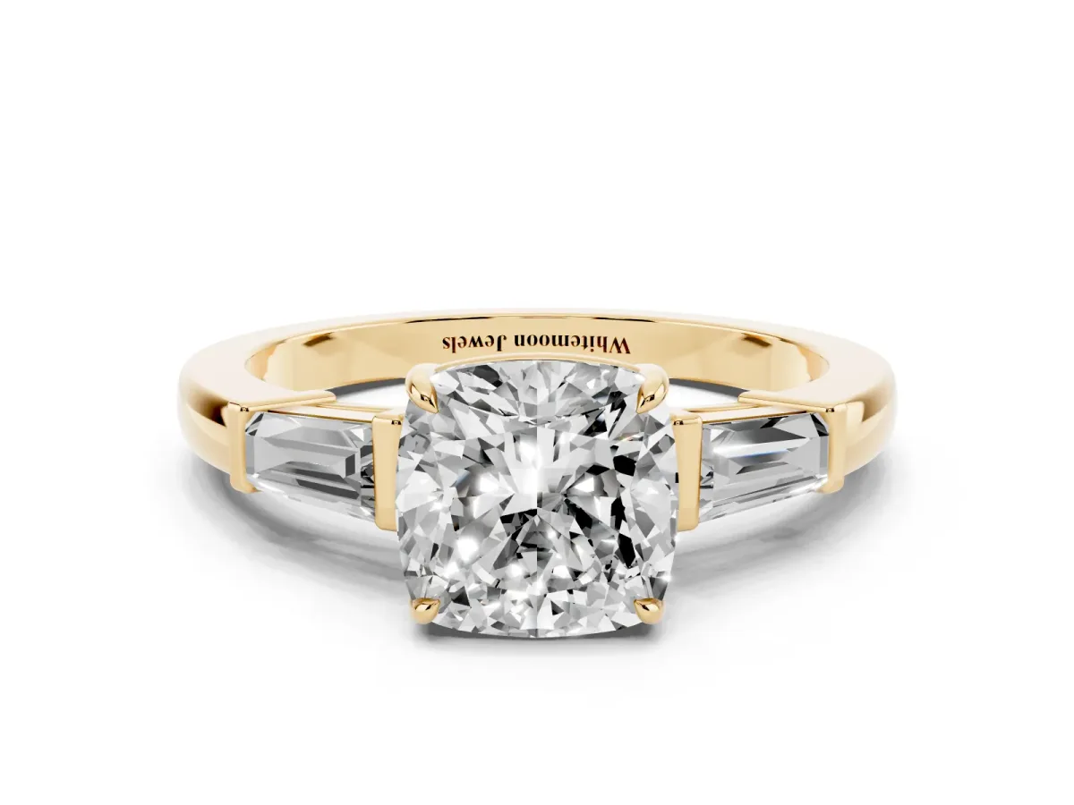 Cushion Cut Diamond Three-Stone Ring with Tapered Baguette Side Stones and Prong Setting Yellow gold